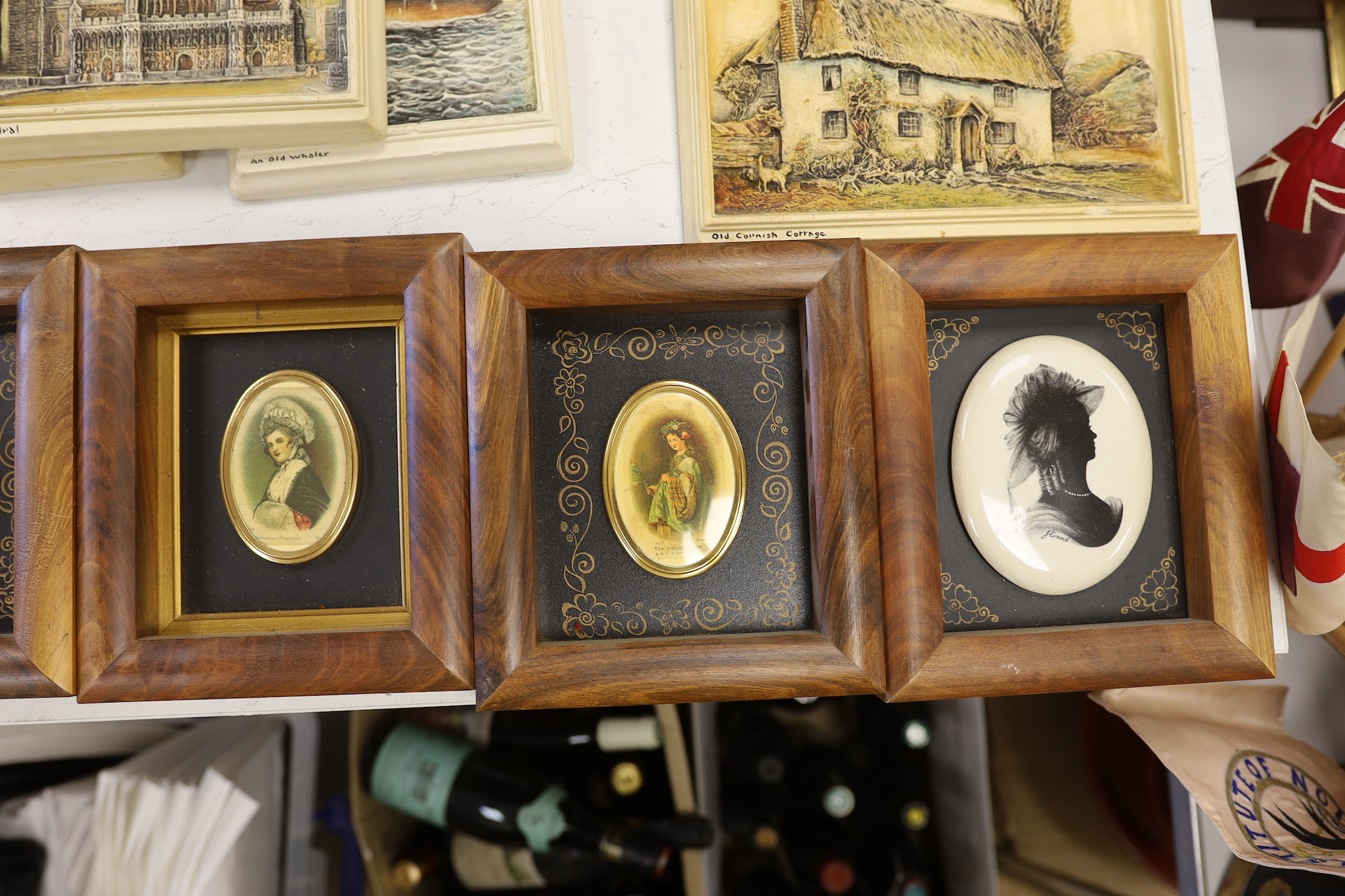 A collection of ten Osborne Ivorex plaques and framed silks
